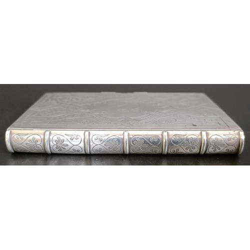 135 - A Victorian novelty silver card case, in the form of a book, London 1861, 2.7 ozt