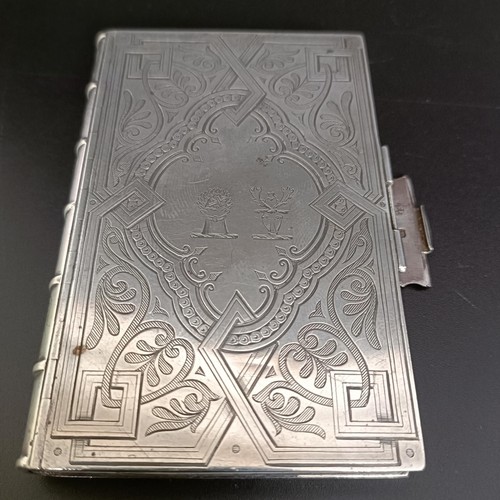 135 - A Victorian novelty silver card case, in the form of a book, London 1861, 2.7 ozt