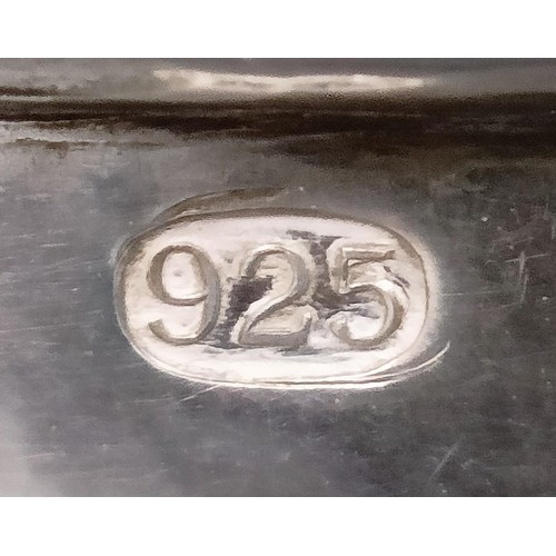 137 - A pair of silver tumblers, engraved names to the borders and with hammered decoration, Malcolm Apple... 