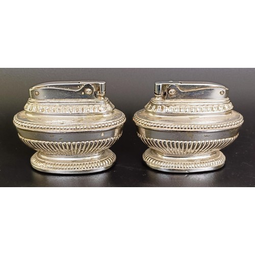 170 - A pair of silver coloured metal salts, inset with four coins, a pair of silver plated bottle coaster... 