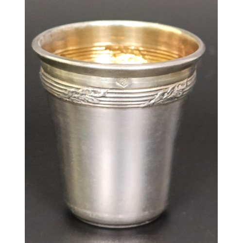 141 - A set of twelve Continental silver coloured metal shot cups, 107 g, cased