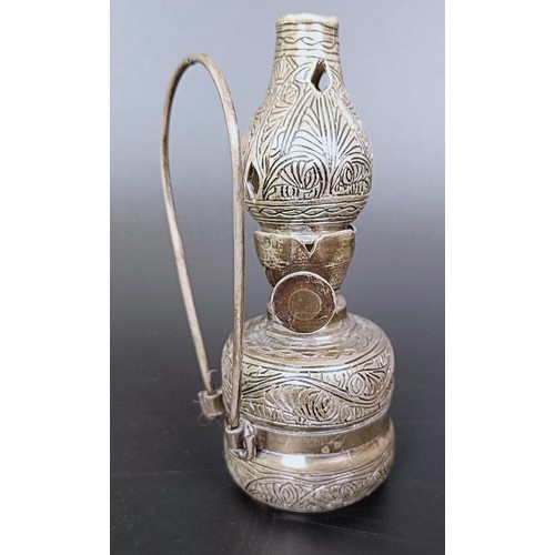 174 - ***Regretfully WIthdrawn*** A Syrian, Aleppo silver coloured metal novelty oil lamp, 11 cm high