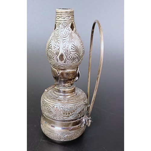 174 - ***Regretfully WIthdrawn*** A Syrian, Aleppo silver coloured metal novelty oil lamp, 11 cm high