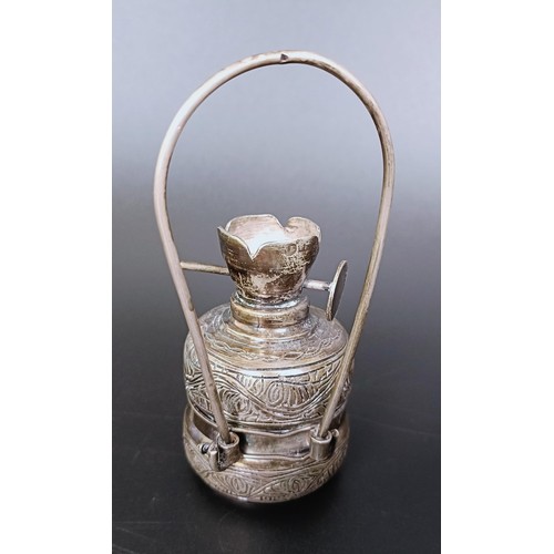 174 - ***Regretfully WIthdrawn*** A Syrian, Aleppo silver coloured metal novelty oil lamp, 11 cm high