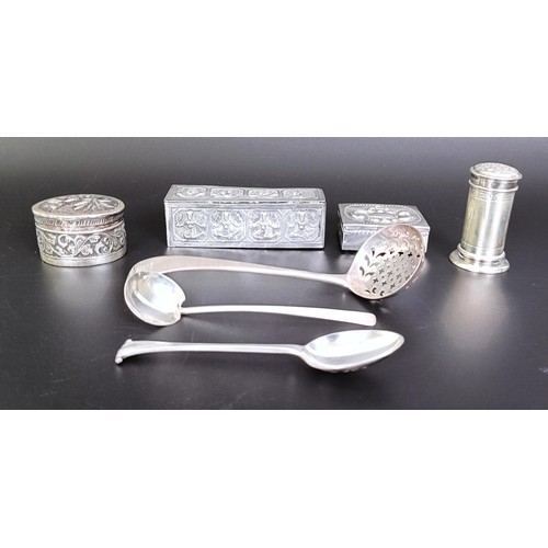 175 - An Eastern silver coloured metal box, an Old English pattern sifting spoon, two boxes, two spoons an... 