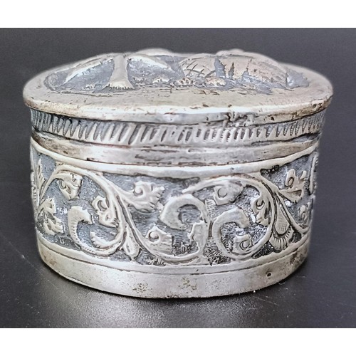 175 - An Eastern silver coloured metal box, an Old English pattern sifting spoon, two boxes, two spoons an... 