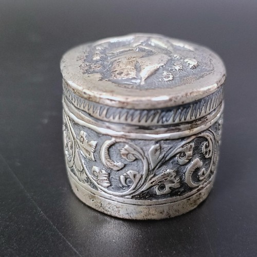 175 - An Eastern silver coloured metal box, an Old English pattern sifting spoon, two boxes, two spoons an... 