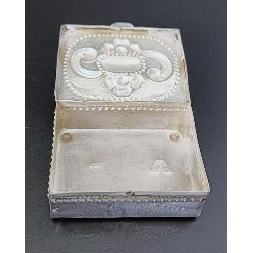 175 - An Eastern silver coloured metal box, an Old English pattern sifting spoon, two boxes, two spoons an... 