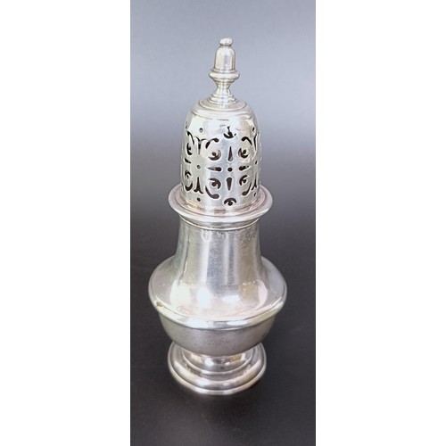 177 - An early 19th century silver caster, marks rubbed, 13 cm high, and another similar, 10 cm high, 6.6 ... 