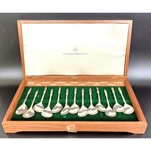 150 - A set of thirteen commemorative silver spoons, with finials in the form of saints, Birmingham 1951, ... 