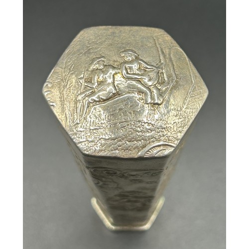 152 - A Continental silver coloured metal desk seal, decorated figures, 7 cm high