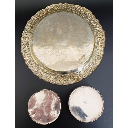 156 - An Eastern silver coloured metal tray, and two round boxes (3)