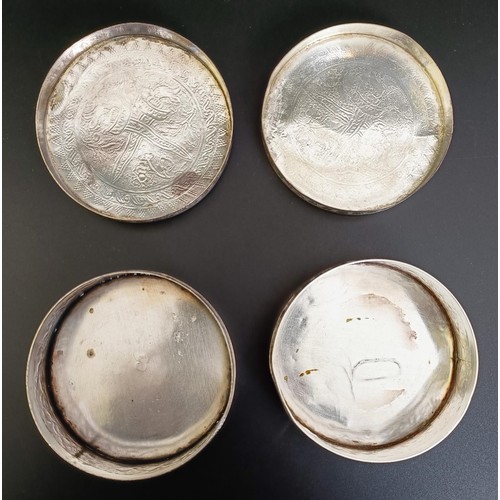 156 - An Eastern silver coloured metal tray, and two round boxes (3)