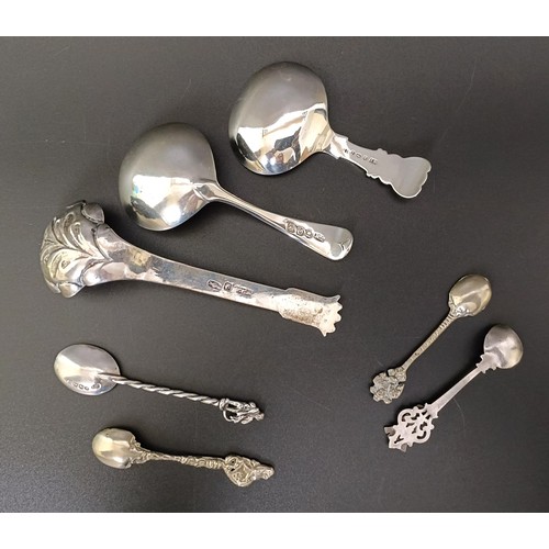 188 - A George III silver Old English pattern caddy spoon, two other caddy spoons, and four salt spoons, v... 