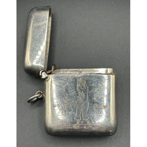 192 - A George V silver vesta, engraved golfers, Chester 1913, 38.9 g, 4.5 cm high