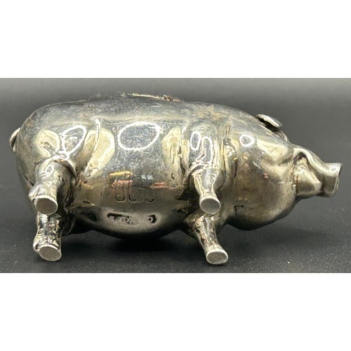 197 - An Edward VII novelty silver pig pin cushion, Birmingham 1904, 3 cm high