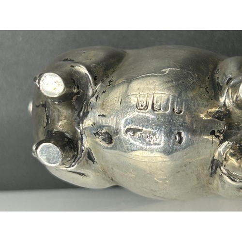 197 - An Edward VII novelty silver pig pin cushion, Birmingham 1904, 3 cm high