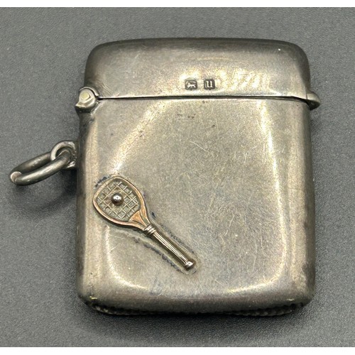 212 - A George V silver vesta case, applied a tennis racket and ball, Birmingham 1919, 24.5 g, 4.5 cm high