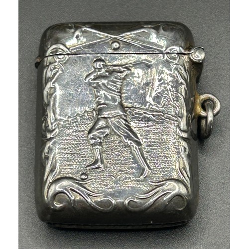 220 - A sterling silver vesta, decorated a golfer, 24.1 g, 4.5 cm high