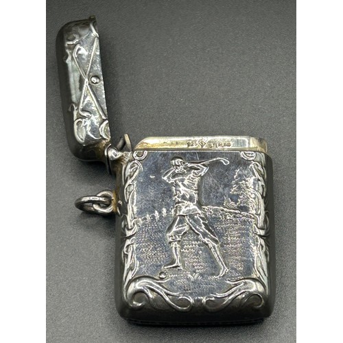 220 - A sterling silver vesta, decorated a golfer, 24.1 g, 4.5 cm high