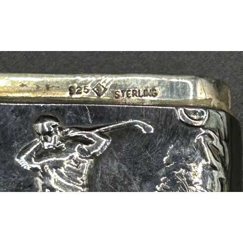 220 - A sterling silver vesta, decorated a golfer, 24.1 g, 4.5 cm high