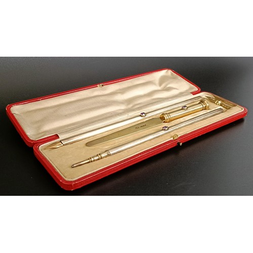 348 - An Edward VII Arts & Crafts silver and amethyst pen set, comprising a pen, letter opener and pro... 