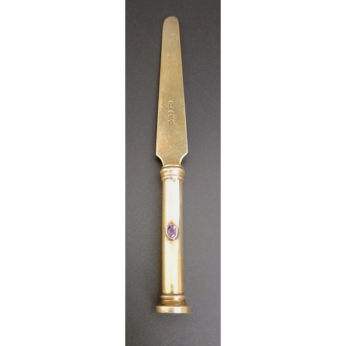 348 - An Edward VII Arts & Crafts silver and amethyst pen set, comprising a pen, letter opener and pro... 