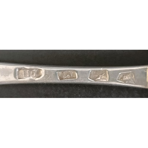 237 - A 17th/18th century silver trefid pattern spoon, initialled, and three silver 18th century Old Engli... 