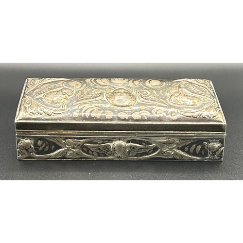 239 - A Victorian silver box, inscribed, embossed with cherubs, London 1896, 2.6 ozt, 11 cm wide