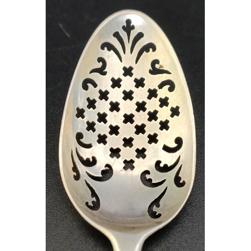 369 - An 18th century silver mote spoon, marks rubbed, and another (2)