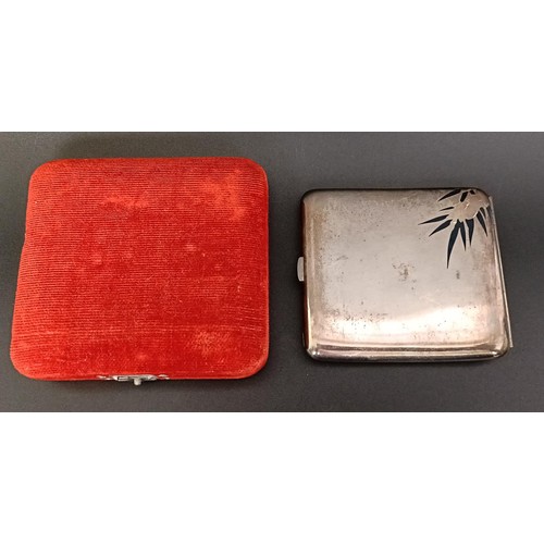 377 - An Eastern silver coloured metal cigarette case, cased