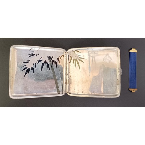 377 - An Eastern silver coloured metal cigarette case, cased