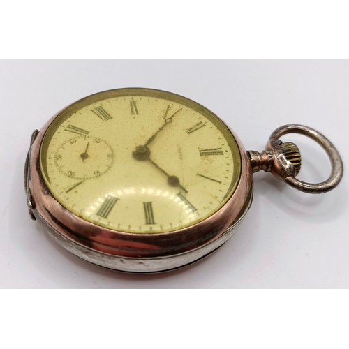 907 - An Omega open face pocket watch, and another, Zenith (2)