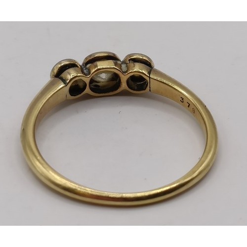 602 - A three stone diamond ring, ring size NProvenance:  Sold on behalf of Dorset Wildlife Trust