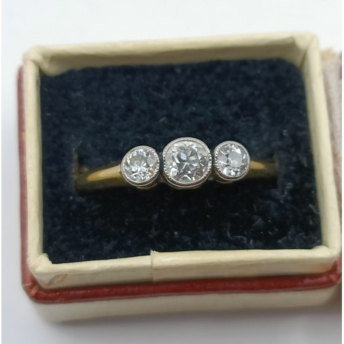 602 - A three stone diamond ring, ring size NProvenance:  Sold on behalf of Dorset Wildlife Trust