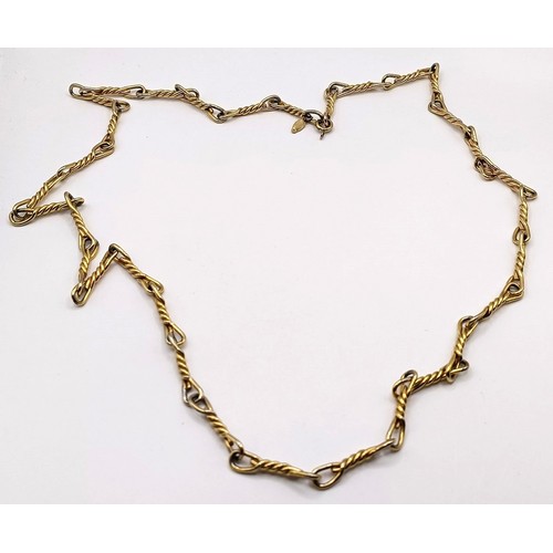 606 - A Christian Dior gold plated necklace