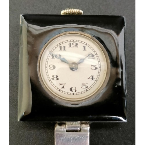 911 - A ladies Art Deco silver paste and black enamel watch