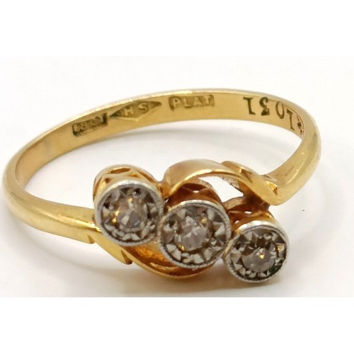 619 - An 18ct gold and three stone diamond ring, ring size J Provenance:  Sold on behalf of Dorset Wildlif... 