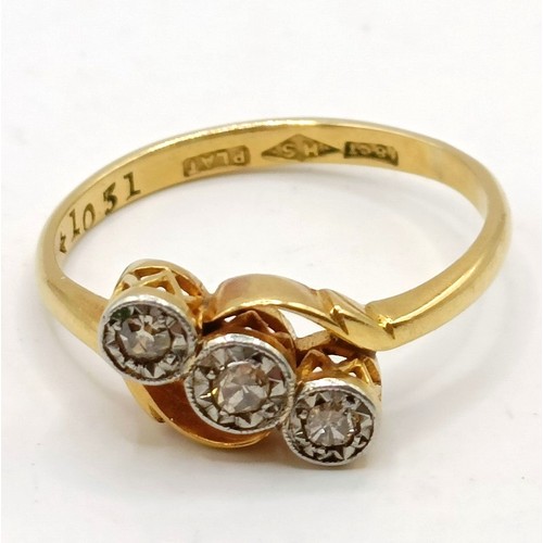 619 - An 18ct gold and three stone diamond ring, ring size J Provenance:  Sold on behalf of Dorset Wildlif... 