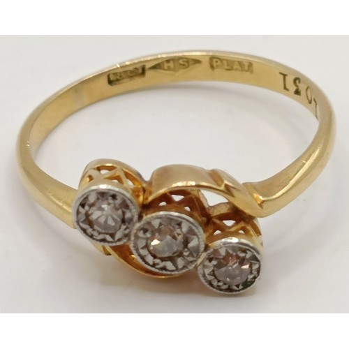 619 - An 18ct gold and three stone diamond ring, ring size J Provenance:  Sold on behalf of Dorset Wildlif... 