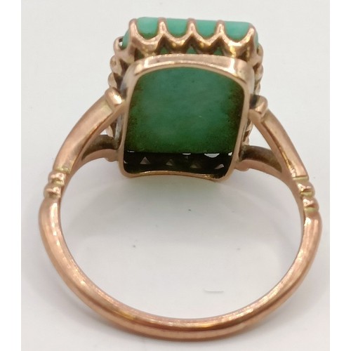 620 - A 9ct gold and green stone ring, ring size M Provenance:  Sold on behalf of Dorset Wildlife Tru... 