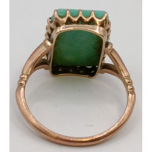 620 - A 9ct gold and green stone ring, ring size M Provenance:  Sold on behalf of Dorset Wildlife Tru... 