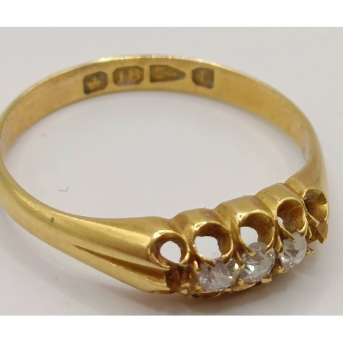 631 - An 18ct gold and diamond three stone ring, ring size M Provenance:  Sold on behalf of Dorset Wildlif... 