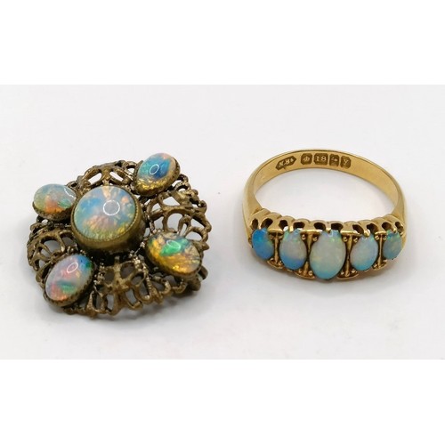 648 - An 18ct gold and opal ring, ring size M, and an opal brooch (2)Provenance:  Sold on behalf of Dorset... 