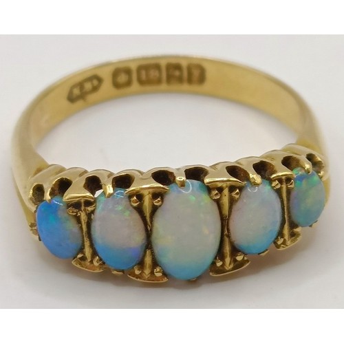 648 - An 18ct gold and opal ring, ring size M, and an opal brooch (2)Provenance:  Sold on behalf of Dorset... 