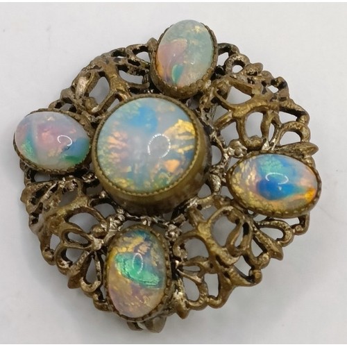 648 - An 18ct gold and opal ring, ring size M, and an opal brooch (2)Provenance:  Sold on behalf of Dorset... 