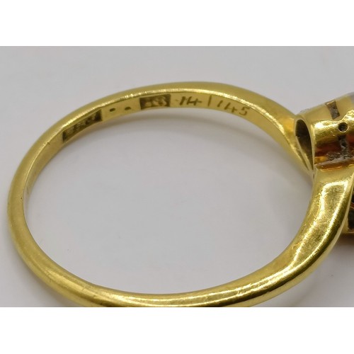 650 - An 18ct gold and diamond cross over ring, ring size K Provenance:  Sold on behalf of Dorset Wildlife... 