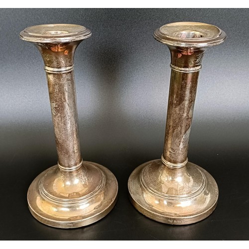 388 - A pair of Edward VII silver candlesticks, Birmingham 1908, 22.8 ozt (all in), 18.5 cm high (2)