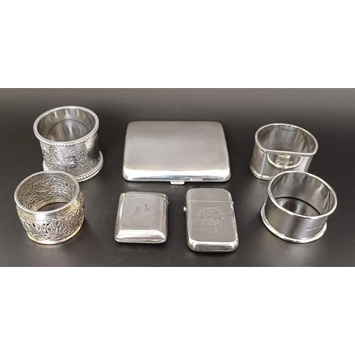 258 - A silver cigarette case, two silver vestas, and four napkin rings, 9.7 ozt (7)