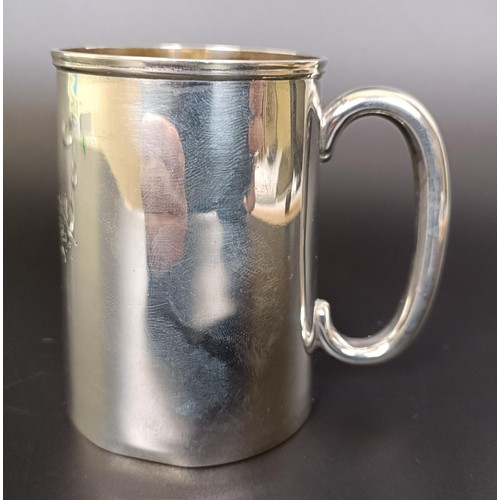 265 - A George V silver mug, and a pair of silver cup holders, various dates and marks, 6.7 ozt (3)